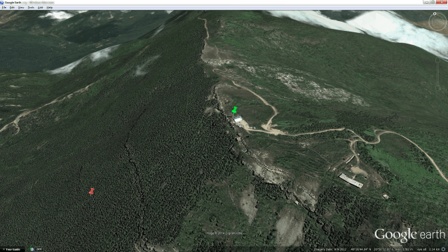 Figure 2: Google Earth screenshot. The red pin is the given site location and the green pin is the adjusted site location.